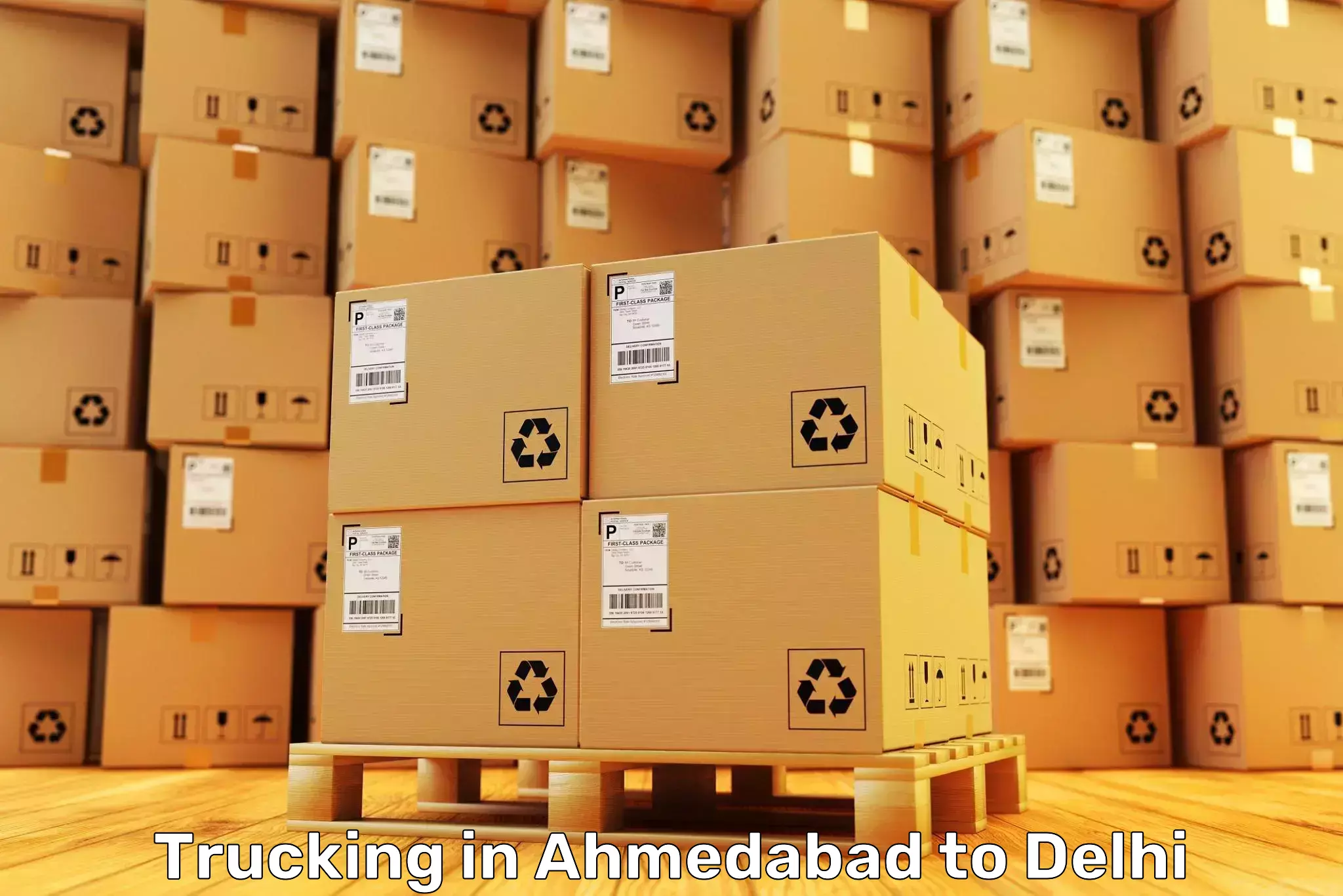 Easy Ahmedabad to Parsvnath Mall Azadpur Trucking Booking